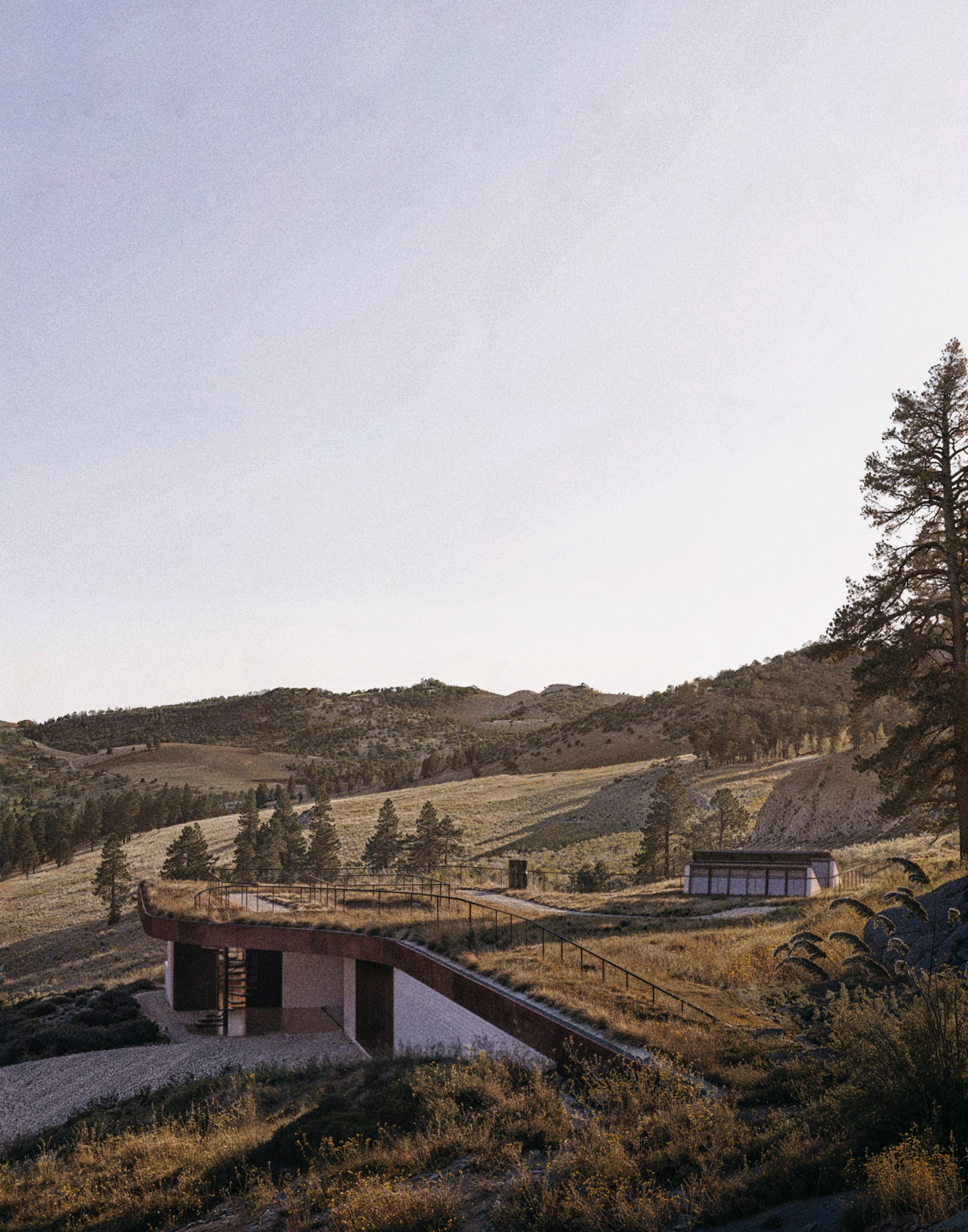 House Nestled in Topography